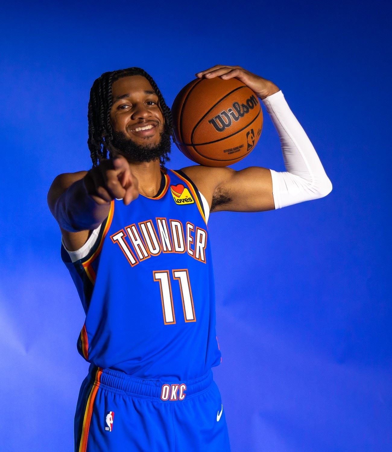 Isaiah Joe holding basketball